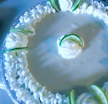 Load image into Gallery viewer, Creamy Key Lime filling with a graham cracker crust &amp; topped with a sweet &amp; tangy whipped cream
